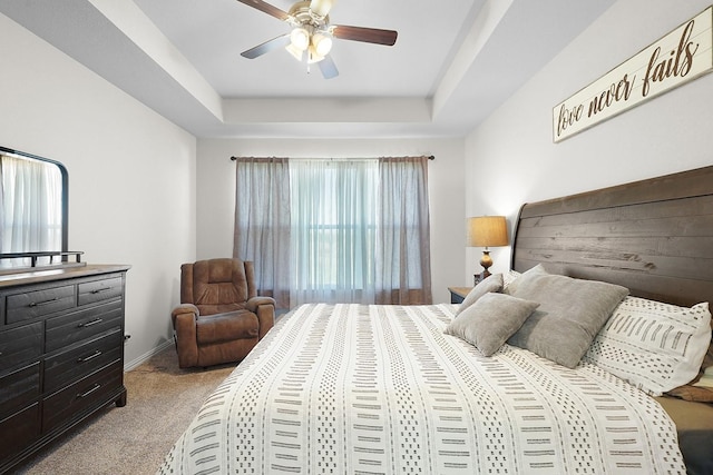 12712 Cold Spring Ln, Ponder, TX 76259 - carpeted bedroom with a tray ceiling and ceiling fan