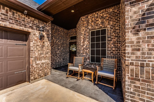 view of patio / terrace with an attached garage