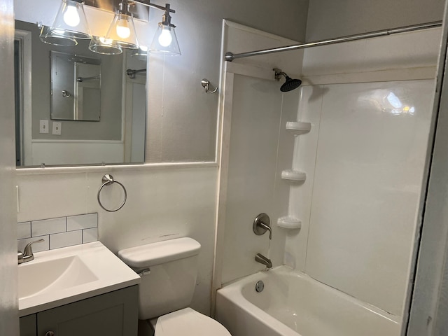 full bathroom with tub / shower combination, vanity, and toilet