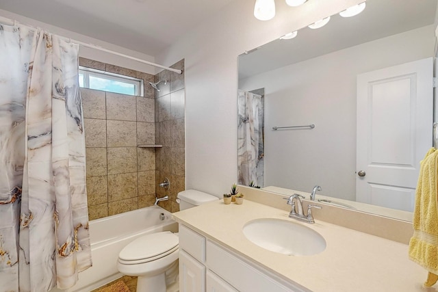 full bathroom featuring shower / bath combination with curtain, vanity, and toilet