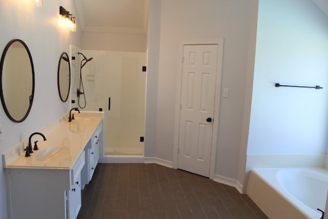 bathroom featuring vanity and separate shower and tub