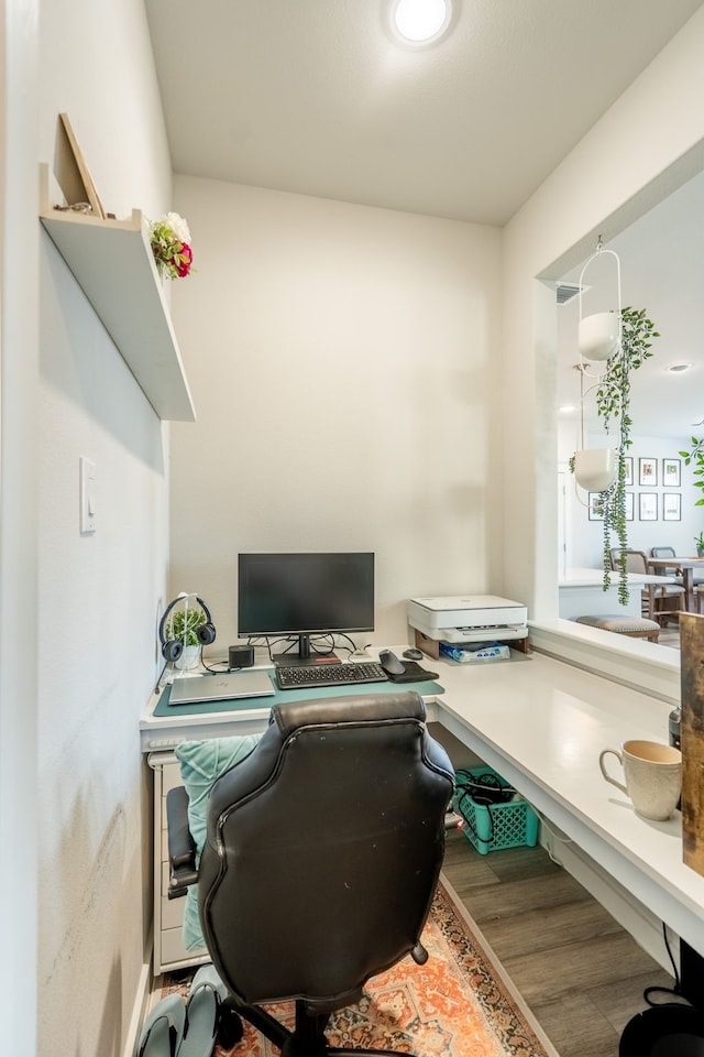 office with hardwood / wood-style flooring