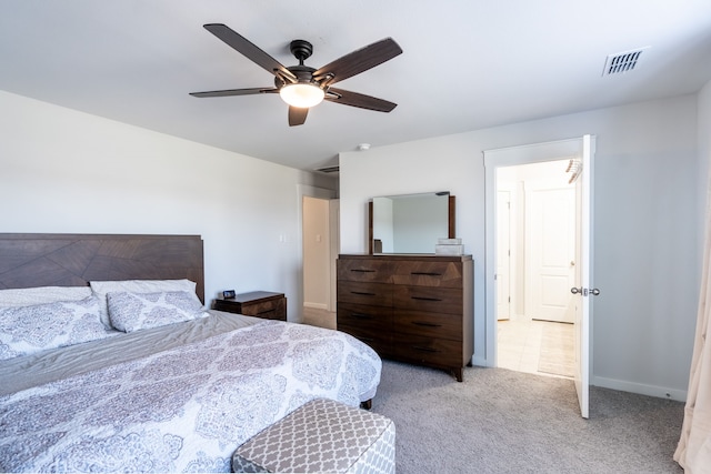 bedroom featuring ceiling fan and light colored carpet