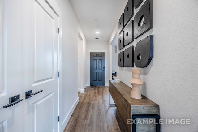 hall featuring hardwood / wood-style floors