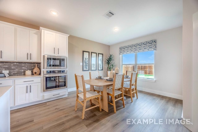 dining area featuring light hardwood / wood-style flooring