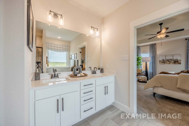 bathroom featuring vanity and ceiling fan