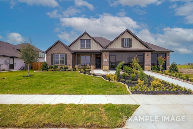 craftsman house with a front yard