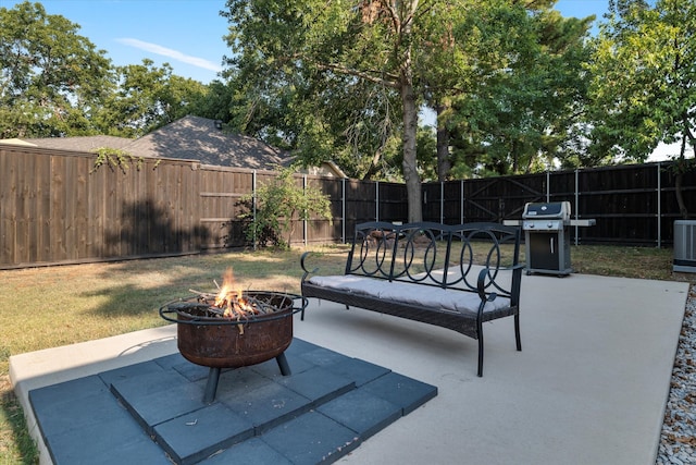 view of patio / terrace with grilling area and an outdoor fire pit