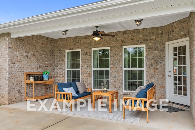 view of patio with outdoor lounge area and ceiling fan