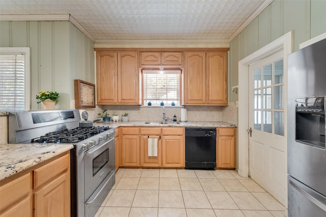 kitchen with light tile patterned floors, sink, appliances with stainless steel finishes, and ornamental molding