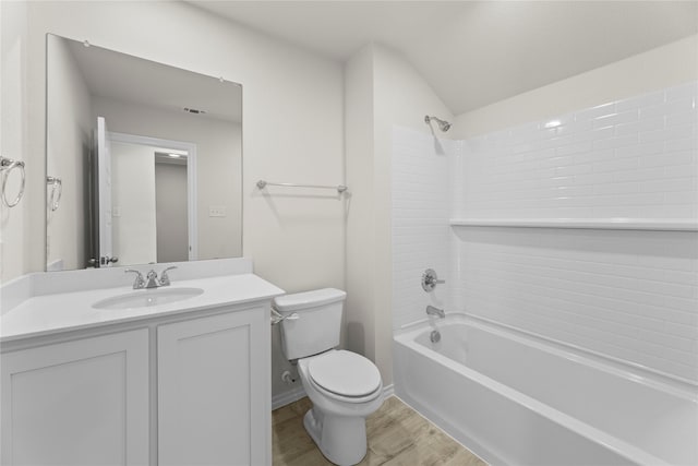 full bathroom with shower / bathing tub combination, vanity, toilet, and hardwood / wood-style floors