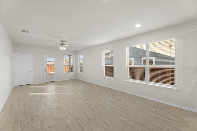 unfurnished living room with light hardwood / wood-style floors and ceiling fan