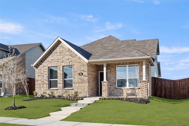 craftsman-style home with a front yard