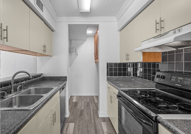 kitchen featuring light hardwood / wood-style floors, black range with electric stovetop, a textured ceiling, stainless steel dishwasher, and sink