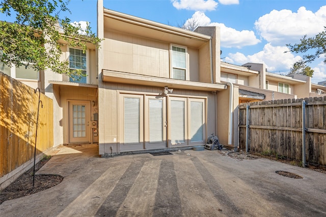 rear view of house with a patio area