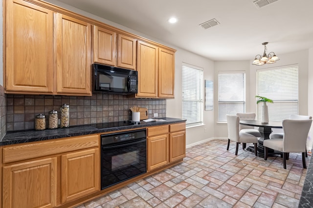 kitchen featuring decorative backsplash, decorative light fixtures, black appliances, and a chandelier