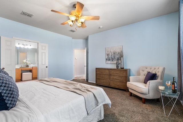 bedroom featuring ceiling fan and dark carpet