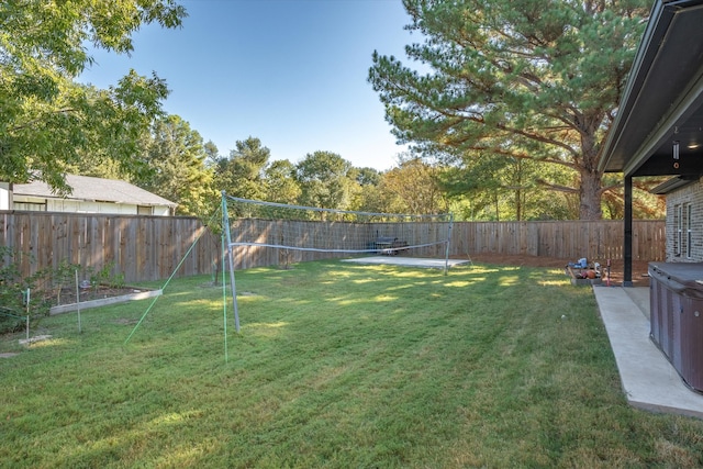 view of yard featuring volleyball court