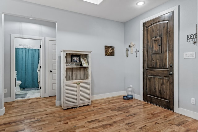 foyer featuring hardwood / wood-style floors