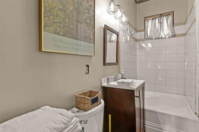 full bathroom with toilet and vanity