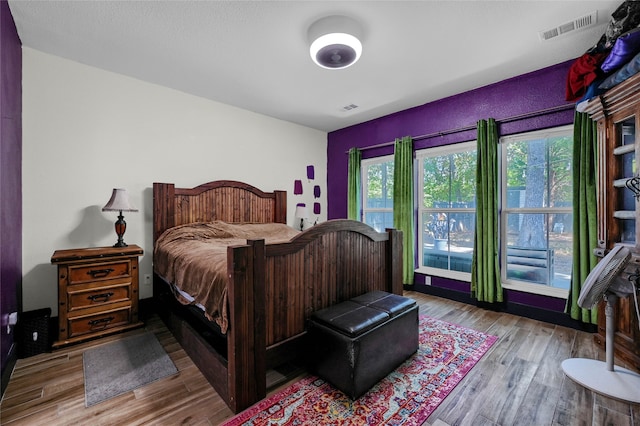 bedroom featuring light hardwood / wood-style flooring