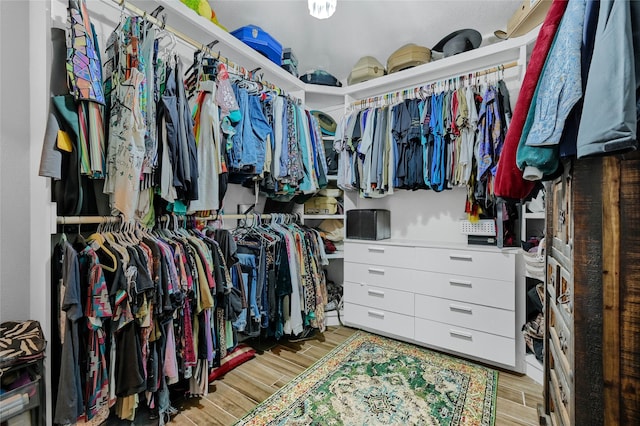 walk in closet featuring light wood-type flooring