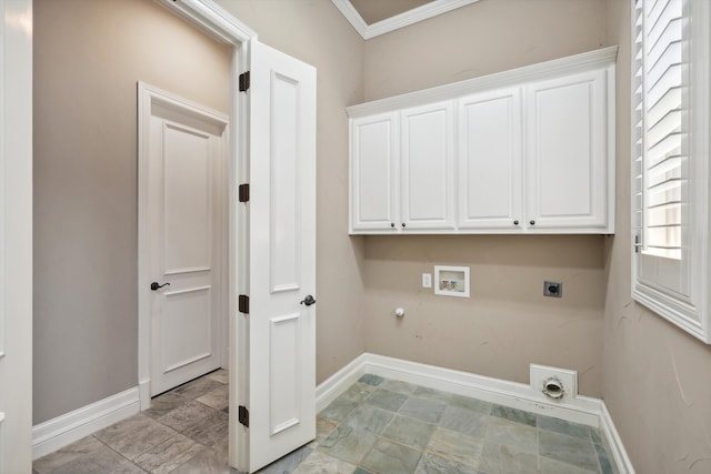 laundry area featuring electric dryer hookup, cabinets, hookup for a gas dryer, hookup for a washing machine, and ornamental molding