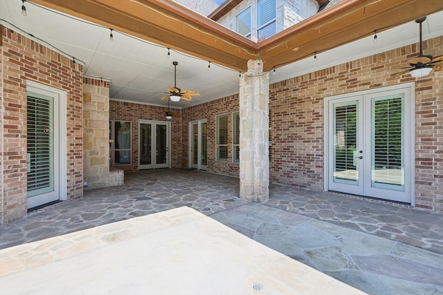 view of patio featuring french doors and ceiling fan