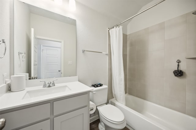 full bathroom with shower / bathtub combination with curtain, vanity, and toilet