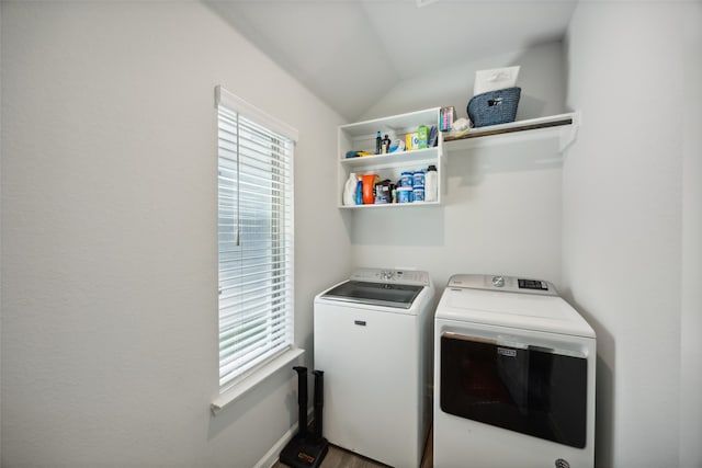 laundry room featuring hardwood / wood-style flooring and independent washer and dryer