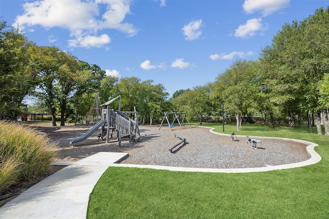 view of play area featuring a lawn