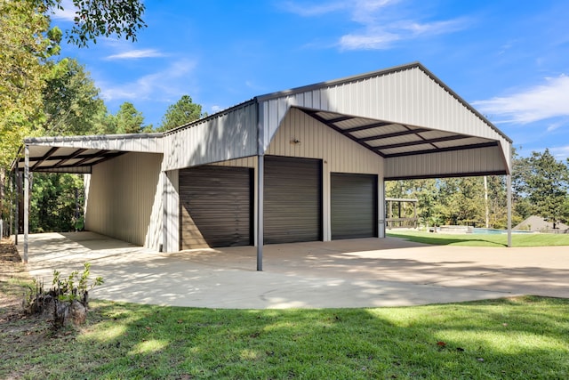 garage with a yard