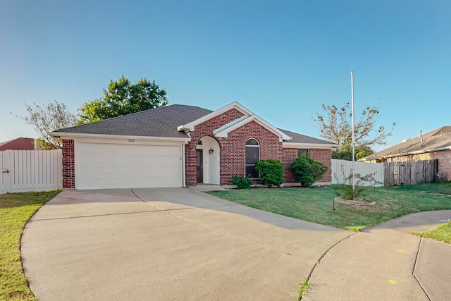 single story home with a garage and a front yard