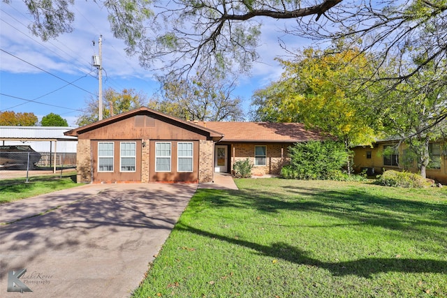 single story home with a front lawn