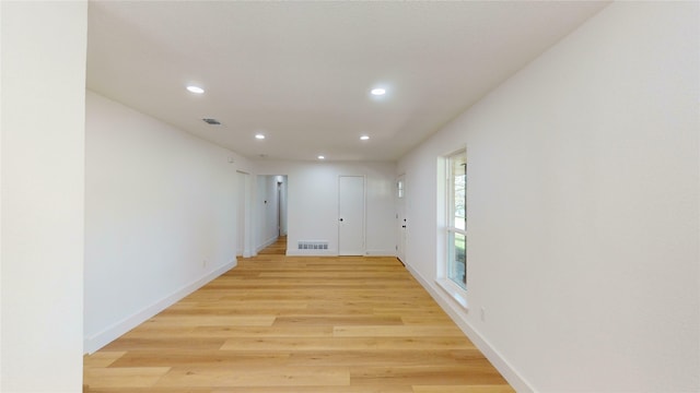 corridor featuring light hardwood / wood-style flooring