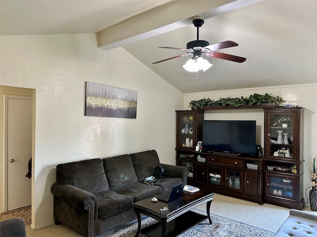 living room featuring lofted ceiling with beams, ceiling fan, and light carpet