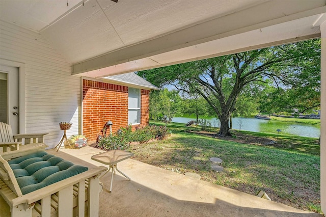 view of patio / terrace featuring a water view