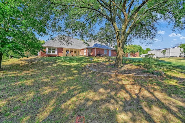 view of front of home with a front lawn