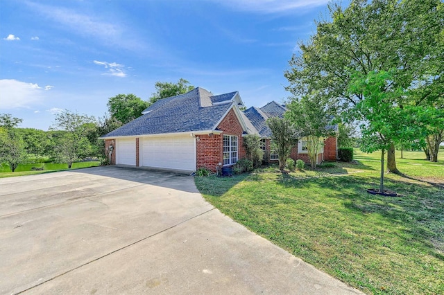 view of home's exterior with a lawn and a garage