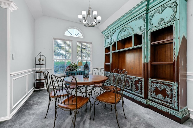 dining space featuring dark carpet, vaulted ceiling, and a notable chandelier