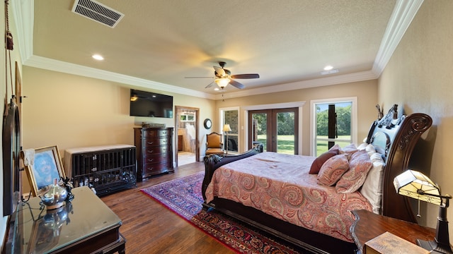 bedroom with dark hardwood / wood-style flooring, ceiling fan, french doors, and ornamental molding