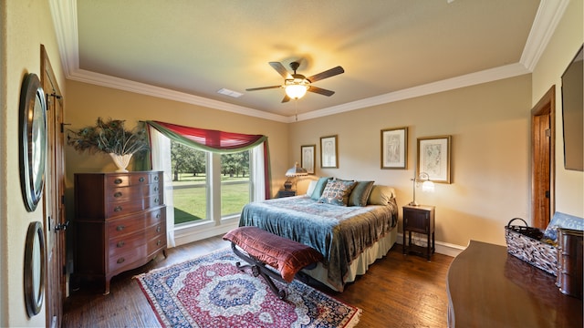 bedroom featuring ceiling fan, crown molding, dark wood-type flooring, and stainless steel refrigerator