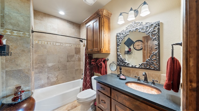 full bathroom featuring vanity, toilet, and shower / tub combo