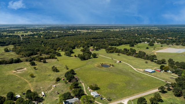 birds eye view of property featuring a rural view