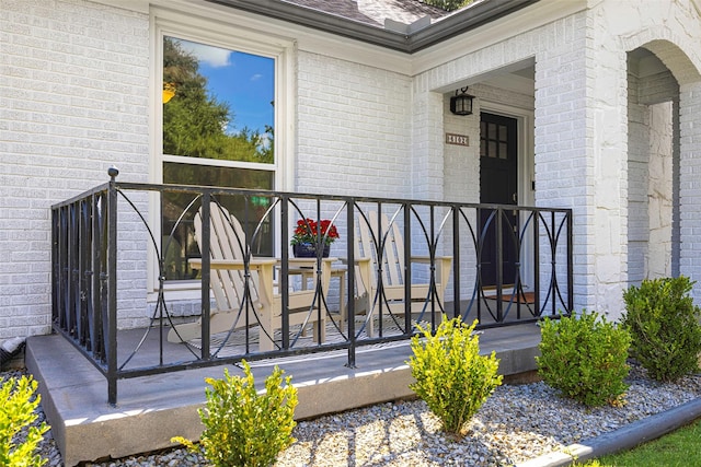 doorway to property featuring covered porch