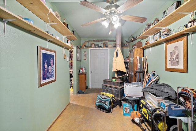 basement with carpet and ceiling fan