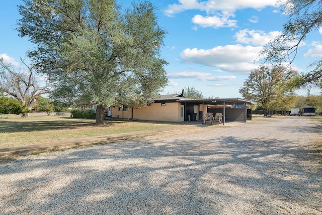 exterior space featuring a carport