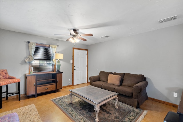 living room featuring ceiling fan