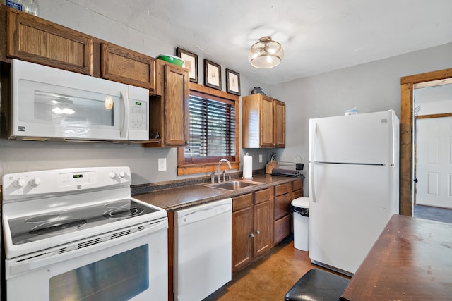 kitchen with white appliances and sink