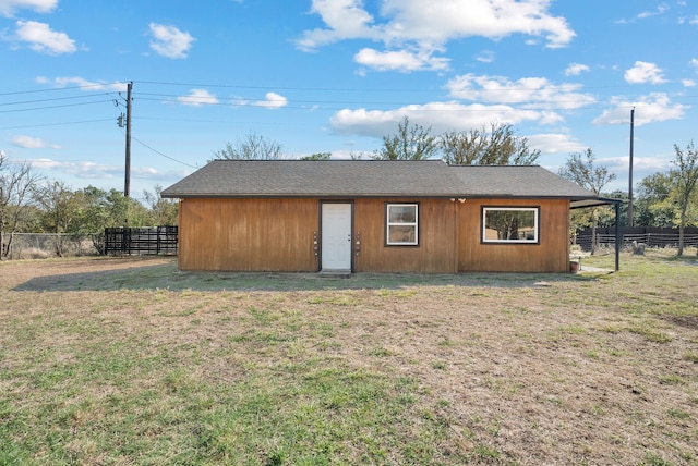 view of outdoor structure featuring a yard